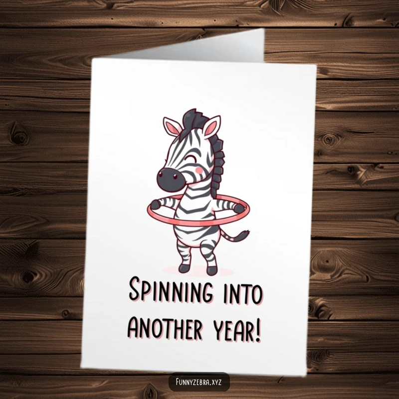 Funny Free Printable Birthday Card: A zebra enthusiastically spins a colorful hula hoop around its midsection with pure joy.
