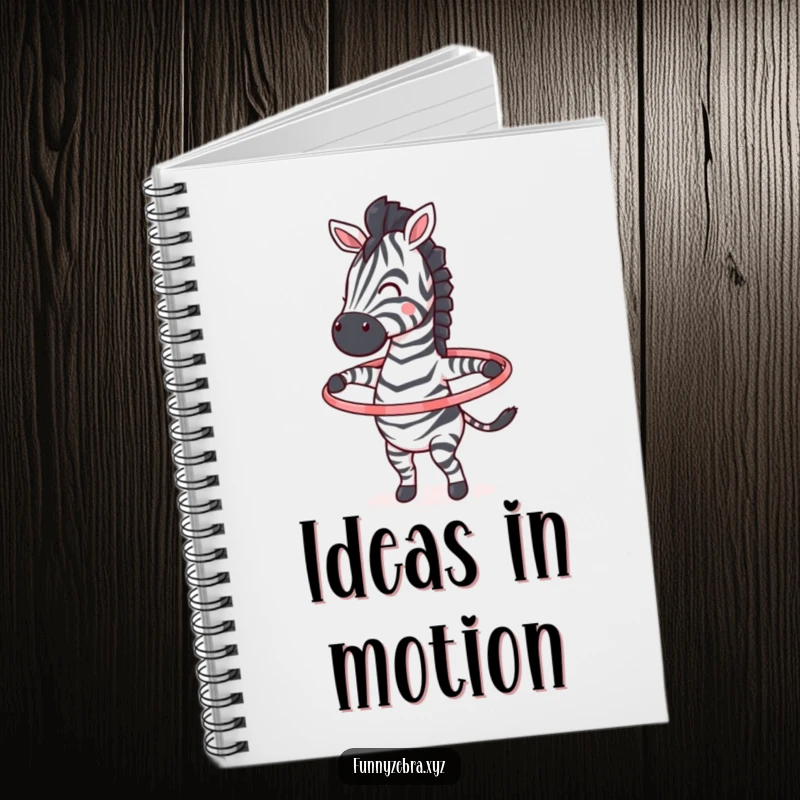 Funny notebook cover art showing a lively zebra character joyfully spinning a hula hoop with great enthusiasm.